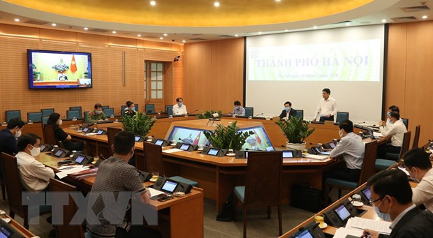 Chủ tịch Ủy ban Nhân dân thành phố Hà Nội Nguyễn Đức Chung phát biểu tại điểm cầu thành phố Hà Nội. (Ảnh: Văn Điệp/TTXVN) Chủ tịch Ủy ban Nhân dân thành phố Hà Nội Nguyễn Đức Chung phát biểu tại điểm cầu thành phố Hà Nội. (Ảnh: Văn Điệp/TTXVN)