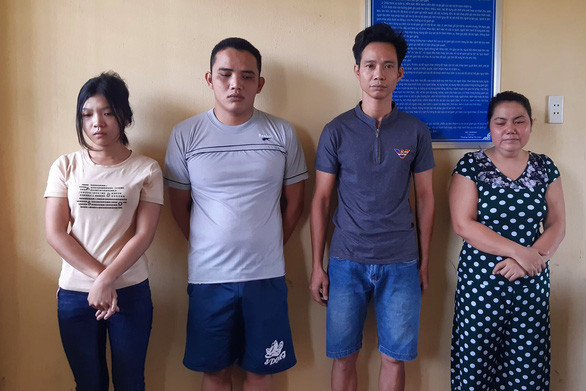 Bốn bị can Huyền, Diện, Huân và Hiên (từ trái qua) tại cơ quan CSĐT Công an TP Biên Hoà - Ảnh: B.A