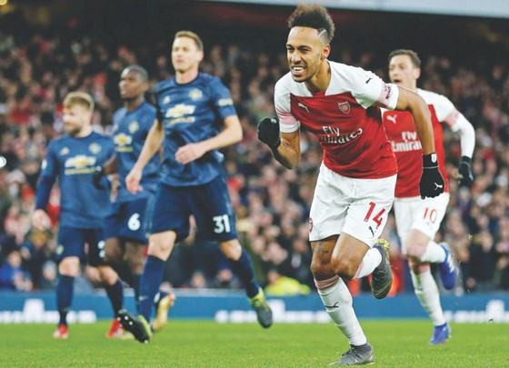 Pierre-Emerick Aubameyang trong một lần ghi bàn vào lưới Man.United. Ảnh: Getty Images Pierre-Emerick Aubameyang trong một lần ghi bàn vào lưới Man.United. Ảnh: Getty Images