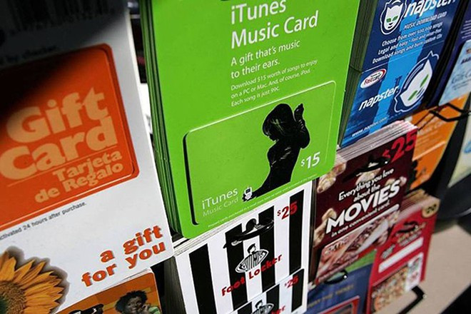 Apple được cho là có thể kiểm soát các giao dịch lừa đảo với thẻ quà tặng iTunes ẢNH: AFP
