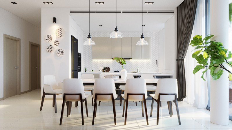 Phòng ăn sử dụng toàn bàn ghế màu trắng, nhấn nhá thêm chút cây xanh tạo ra nguồn năng lượng tích cực.