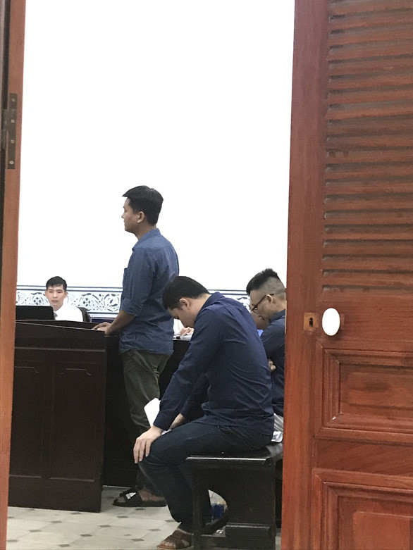 Các bị cáo tại tòa sáng 23-7- Ảnh: TÂM LỤA