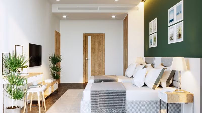 Kệ tivi được đặt ngay ngắn giữa hai chậu cây. Kệ tivi được đặt ngay ngắn giữa hai chậu cây.