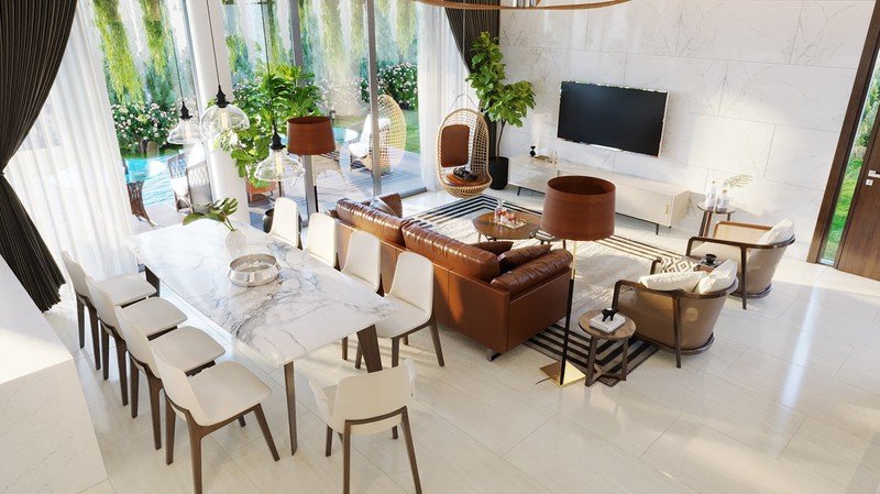 Nhờ sử dụng cửa bằng kính mà dù từ phòng khách hay phòng ăn, các thành viên cũng đều quan sát được khu vườn và hồ bơi phía trước.