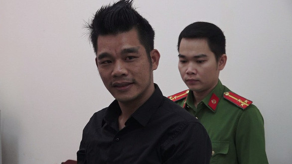  Võ Thanh Long tại cơ quan công an- Ảnh: HUY PHÁCH