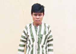 Đối tượng Đinh Văn Mu (32 tuổi, làng Đăk Tơ Lông, xã Sơn Lang, huyện Kbang), chủ mưu trong vụ cưa gỗ cổ thụ trái phép tại Khu Bảo tồn thiên nhiên Kon Chư Răng (huyện Kbang, tỉnh Gia Lai). Ảnh: Ngọc Thu 