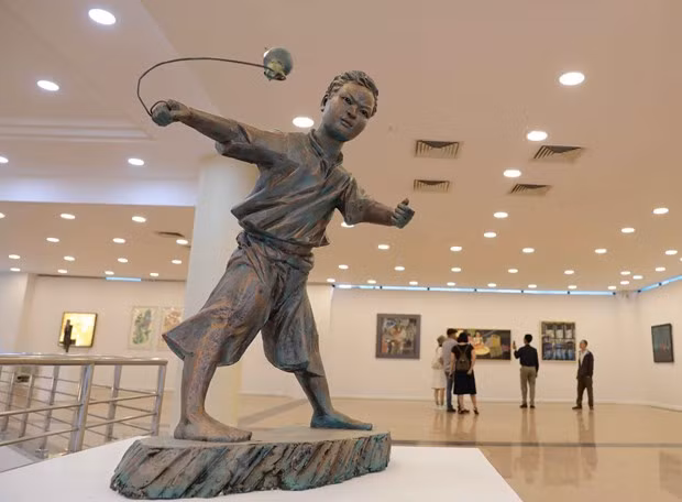 Một tác phẩm trưng bày tại triển lãm. (Ảnh: Thanh Tùng/TTXVN) Một tác phẩm trưng bày tại triển lãm. (Ảnh: Thanh Tùng/TTXVN)