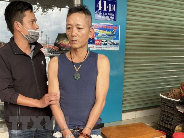 Đối tượng Hoàng khi bị bắt quả tang. (Ảnh: TTXVN phát)