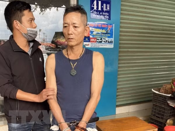 Đối tượng Hoàng khi bị bắt quả tang. (Ảnh: TTXVN phát)