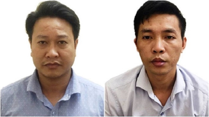 Hai bị can Đỗ Mạnh Tuấn (phải) và Nguyễn Khắc Tuấn (trái).