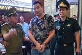 Zhang Hongjia bị bắt.