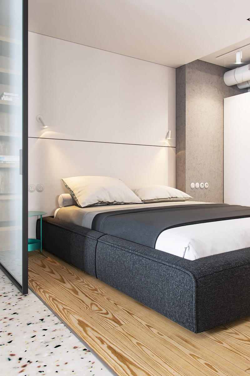 Bên trong phòng ngủ, sàn gỗ công nghiệp thay thế sàn gạch truyền thống. Một bức tường đầu giường được ốp màu trắng chứa hệ thống cách âm tường hiện đại. Bên trong phòng ngủ, sàn gỗ công nghiệp thay thế sàn gạch truyền thống. Một bức tường đầu giường được ốp màu trắng chứa hệ thống cách âm tường hiện đại.