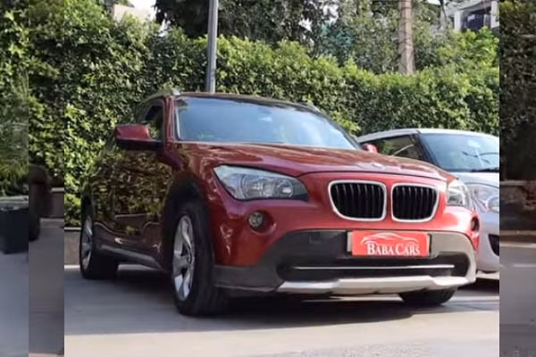 BMW X1 2011 rao giá 250 triệu đồng.