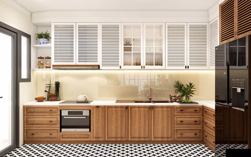 Hệ thống tủ bếp làm bằng gỗ vừa hiện đại vừa truyền thống. Tủ bếp trên có các khe thoáng khí giữ cho thực phẩm luôn khô ráo. Hệ thống tủ bếp làm bằng gỗ vừa hiện đại vừa truyền thống. Tủ bếp trên có các khe thoáng khí giữ cho thực phẩm luôn khô ráo.