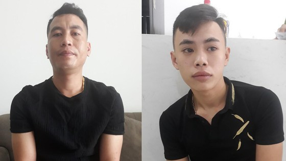 Từ trái sang, đối tượng Nguyễn Minh Tùng và Phạm Quang Khiêm Từ trái sang, đối tượng Nguyễn Minh Tùng và Phạm Quang Khiêm