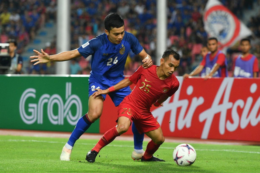 Indonesia (áo đỏ) bị đánh giá là đội bóng yếu nhất bảng G. Ảnh: Getty.  Indonesia (áo đỏ) bị đánh giá là đội bóng yếu nhất bảng G. Ảnh: Getty.