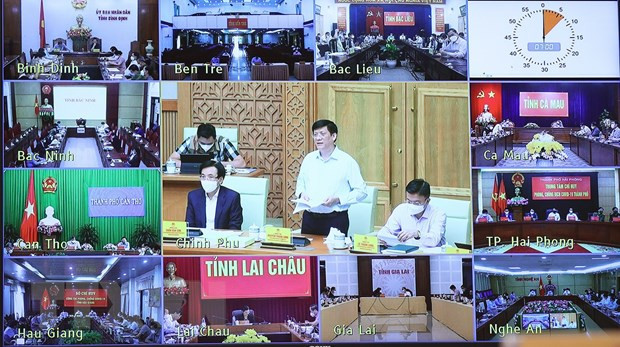 Hội nghị trực tuyến với các điểm cầu tại các địa phương trong cả nước. Ảnh: Dương Giang/TTXVN