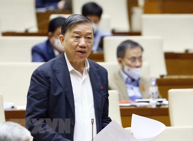Bộ trưởng Bộ Công an Tô Lâm giải trình, làm rõ một số vấn đề đại biểu Quốc hội nêu. (Ảnh: Doãn Tấn/TTXVN)