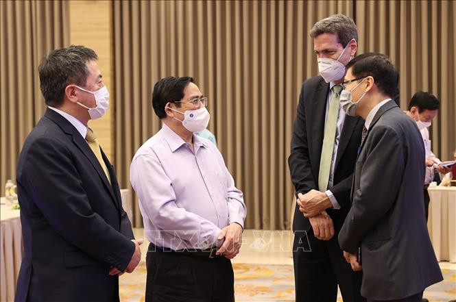 Thủ tướng Phạm Minh Chính với các đại biểu tham dự hội thảo. Ảnh: Dương Giang/TTXVN Thủ tướng Phạm Minh Chính với các đại biểu tham dự hội thảo. Ảnh: Dương Giang/TTXVN