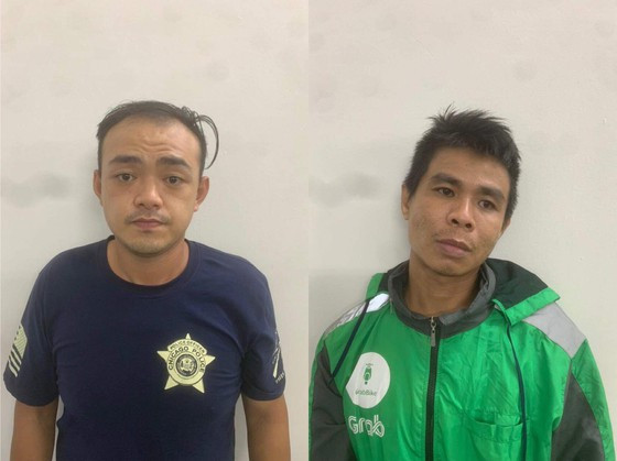  Hai đối tượng tại cơ quan công an. Ảnh: CHÍ THẠCH