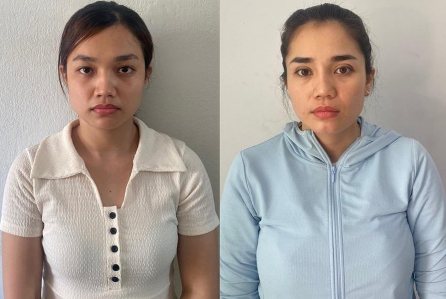 Nguyễn Thị Mỹ Linh (bên trái) và Nguyễn Thị Thu Thảo bị bắt. Ảnh: Nguyễn Tú