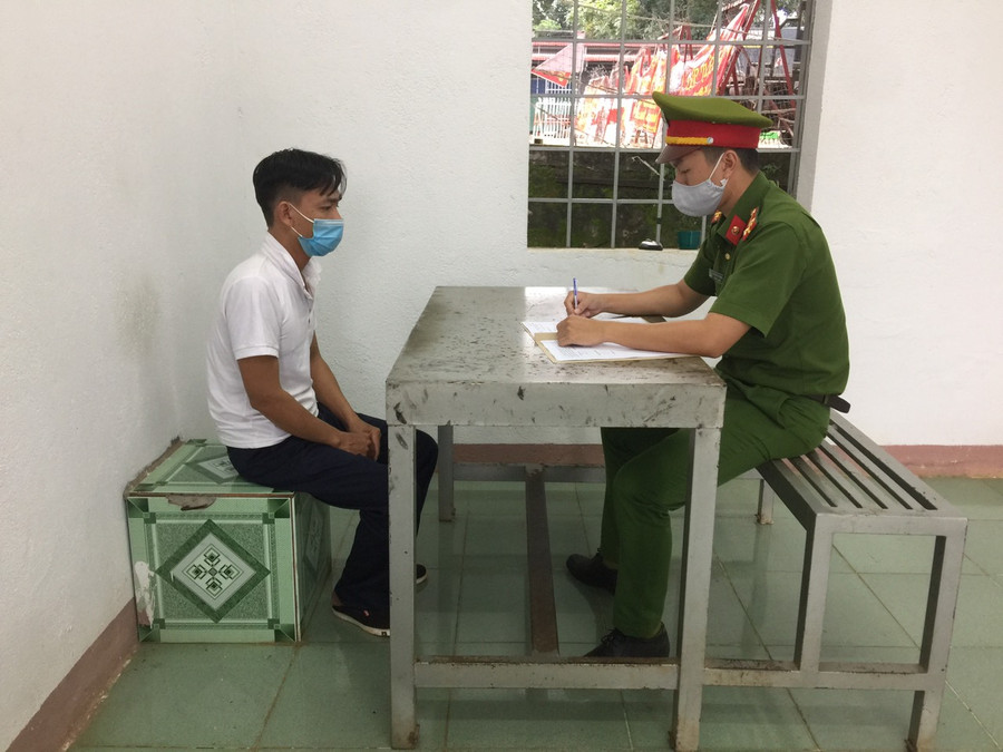 Lê Quang Nhã tại cơ quan công an. Ảnh: CACC