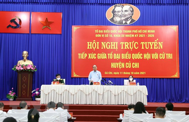 Chủ tịch nước Nguyễn Xuân Phúc phát biểu tại điểm cầu thị trấn Củ Chi. (Ảnh: Thống Nhất/TTXVN) Chủ tịch nước Nguyễn Xuân Phúc phát biểu tại điểm cầu thị trấn Củ Chi. (Ảnh: Thống Nhất/TTXVN)