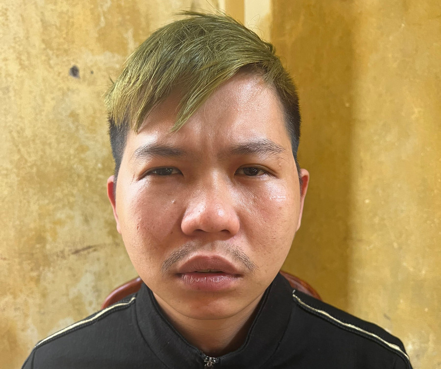 Nguyễn Văn Hoan tại cơ quan điều tra. Ảnh: Công an cung cấp