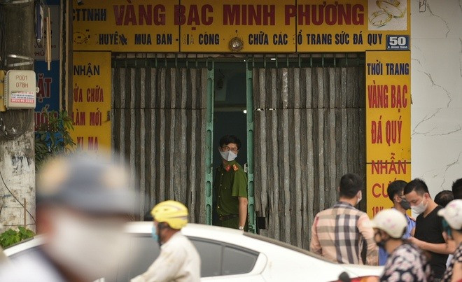 Cơ quan chức năng phong toả nhà ôn Minh để phục vụ điều tra. Ảnh: T.L