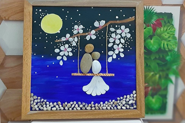 Nghệ thuật sắp đặt đá cuội được thể hiện trên bức tranh. Ảnh: P.L