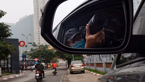 Theo dõi - nghề của những thám tử - Ảnh: V. TUẤN