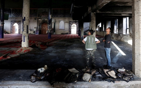  Hiện trường vụ đánh bom. Ảnh: Reuters