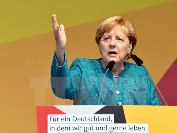 Thủ tướng Đức Angela Merkel tại cuộc họp báo ở Annaberg-Buchholz, Đức, ngày 17-8. Thủ tướng Đức Angela Merkel tại cuộc họp báo ở Annaberg-Buchholz, Đức, ngày 17-8.