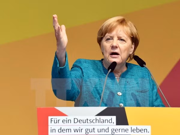 Thủ tướng Đức Angela Merkel tại cuộc họp báo ở Annaberg-Buchholz, Đức, ngày 17-8.