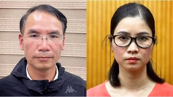 Hai bị can Tào Đức Hiệp và Lê Thị Ngọc Anh tại cơ quan điều tra - Ảnh: Bộ Công an
