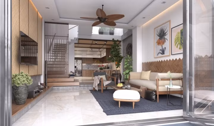 Phòng khách mang phong cách nhiệt đới với cây xanh rải đều khắp phòng, quạt trần bằng gỗ giảm nhiệt cho căn phòng vào những hôm mùa hè oi bức.