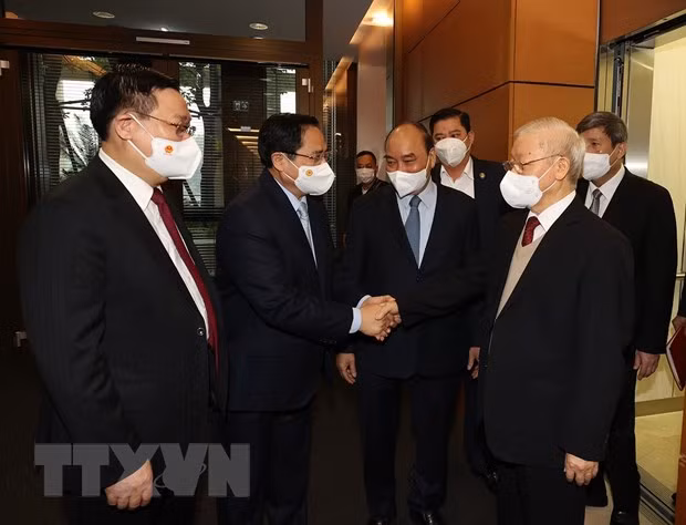 Tổng Bí thư Nguyễn Phú Trọng cùng các đồng chí lãnh đạo Đảng, Nhà nước dự hội nghị. (Ảnh: Trí Dũng/TTXVN)