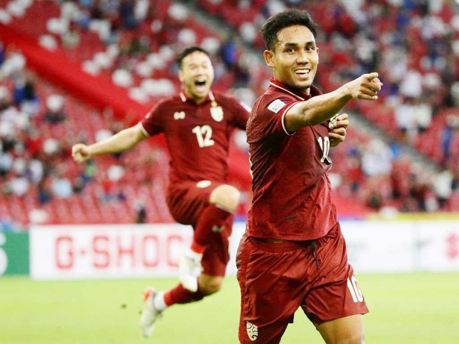 Niềm vui của Teerasil Dangda sau khi ghi bàn. Ảnh: AFP