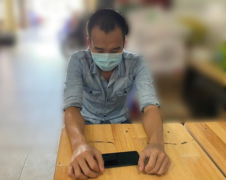 Đặng Thanh Tùng tại cơ quan công an. Ảnh: Công an cung cấp