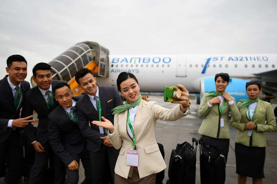Cao điểm, mỗi ngày Bamboo Airways thu về 2,5-3 triệu USD nhưng khi Covid-19 xảy ra, doanh thu trở về 0. Ảnh: Bamboo.  Cao điểm, mỗi ngày Bamboo Airways thu về 2,5-3 triệu USD nhưng khi Covid-19 xảy ra, doanh thu trở về 0. Ảnh: Bamboo.