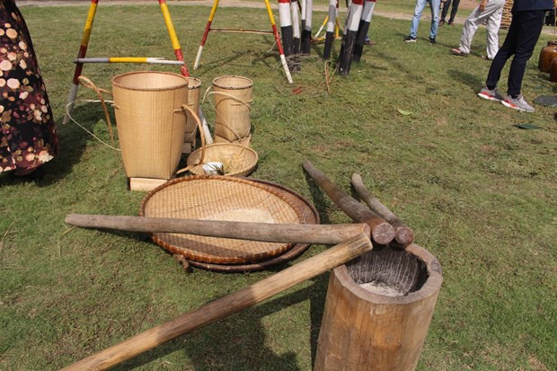 Những dụng cụ mà người phụ nữ sẽ dùng trong phần lễ và hội của ngày mừng lúa mới. (Ảnh: Minh Anh/Vietnam+)