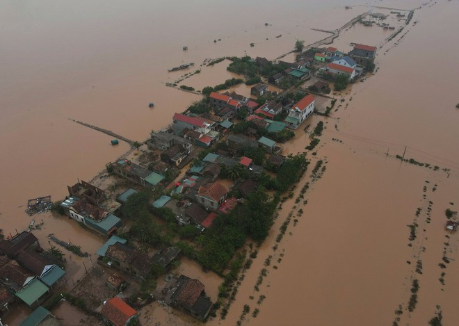 Vùng biệt lập ở xã Quảng Minh bị nước lũ bao vây - Ảnh: Ngọc Dương Vùng biệt lập ở xã Quảng Minh bị nước lũ bao vây - Ảnh: Ngọc Dương