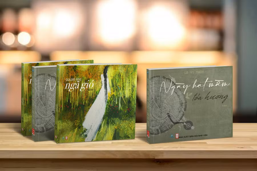 Bìa tập thơ “Ngã gió” của Giang Nhi và “Ngày hạt mầm tỏa hương” của Lê Vi Thủy. Ảnh: Khánh Châu