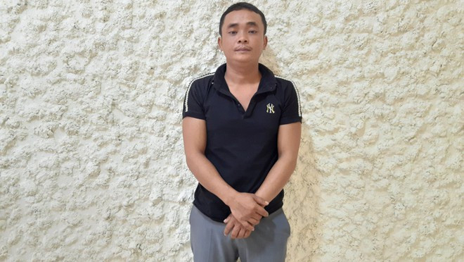 Nghi phạm Trần Minh Trường bị bắt giữ- Ảnh Anh Cường  Nghi phạm Trần Minh Trường bị bắt giữ- Ảnh Anh Cường