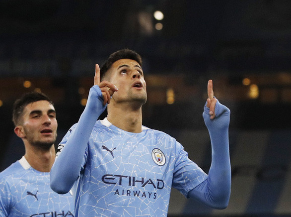 Joao Cancelo ăn mừng bàn nâng tỉ số lên 3-0 cho Man City - Ảnh: REUTERS Joao Cancelo ăn mừng bàn nâng tỉ số lên 3-0 cho Man City - Ảnh: REUTERS