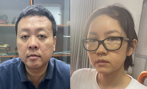 Phong và vợ là Thanh tại cơ quan điều tra. Ảnh: CHÍ THẠCH  Phong và vợ là Thanh tại cơ quan điều tra. Ảnh: CHÍ THẠCH