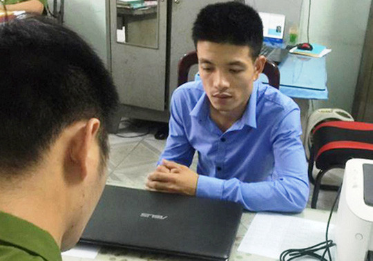 Nguyễn Hữu Tuân tại cơ quan Công an.