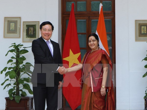 Phó Thủ tướng, Bộ trưởng Ngoại giao Phạm Bình Minh gặp và hội đàm với Bộ trưởng Ngoại giao Ấn Độ Sushama Swaraj. (Ảnh: Huy Bình/TTXVN) Phó Thủ tướng, Bộ trưởng Ngoại giao Phạm Bình Minh gặp và hội đàm với Bộ trưởng Ngoại giao Ấn Độ Sushama Swaraj. (Ảnh: Huy Bình/TTXVN)