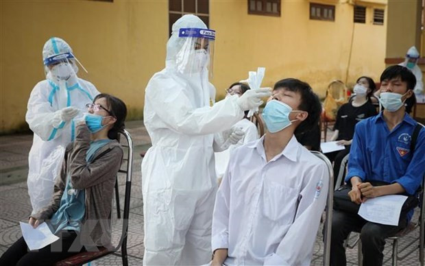Học sinh được xét nghiệm COVID-19. (Ảnh minh họa: TTXVN) Học sinh được xét nghiệm COVID-19. (Ảnh minh họa: TTXVN)