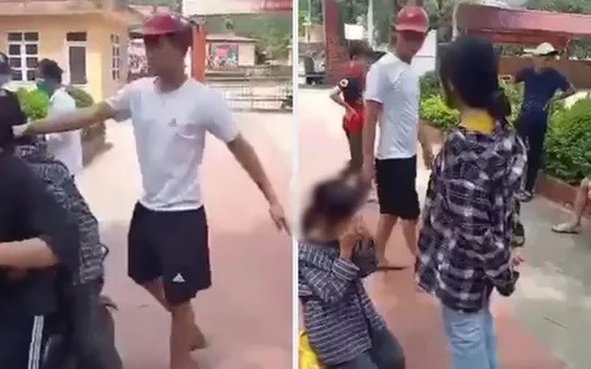 Nữ sinh bị thanh niên xông vào trường tát, bắt quỳ gối giữa sân trường. Ảnh cắt từ clip Nữ sinh bị thanh niên xông vào trường tát, bắt quỳ gối giữa sân trường. Ảnh cắt từ clip